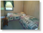 Twin beds in rental, hunter hunting cabin